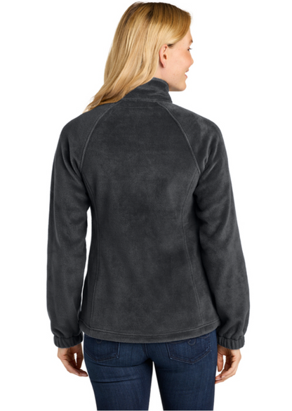 Woman wearing a dark gray fleece jacket on a white background